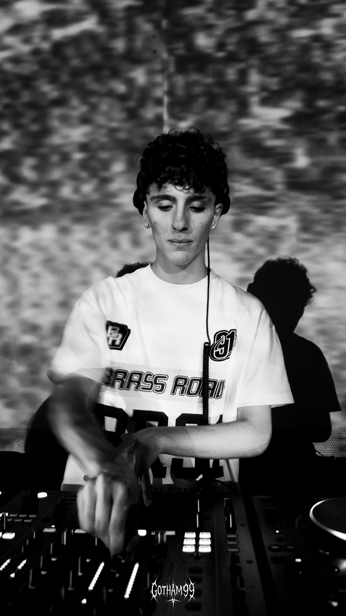 PACIX performing at a DJ mixer